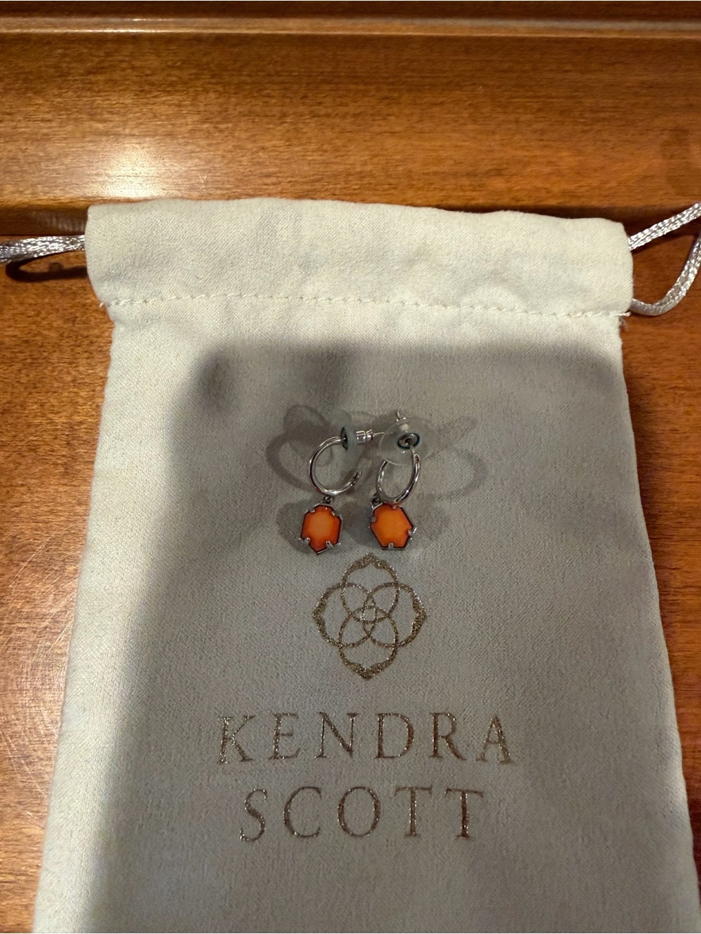 Kendra Scott Silver Hoop Earrings with Orange Hexagon Stones